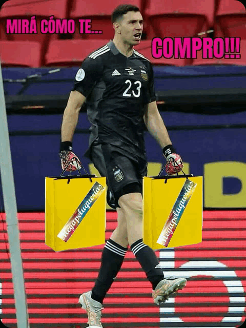 a soccer player with the number 23 on his jersey is holding shopping bags