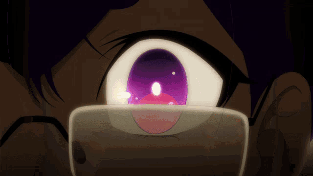 a close up of a cartoon character 's eye with a purple pupil