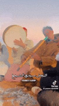 a man playing a tambourine and a man smoking a hookah with the words younes djedid written on the bottom