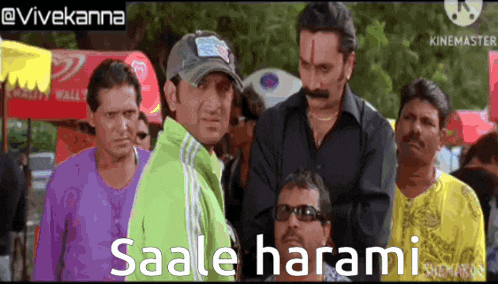 a group of men are standing next to each other and one of them is wearing sunglasses and says saale harami