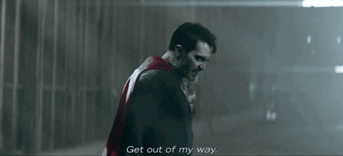 a man in a superhero costume says get out of my way