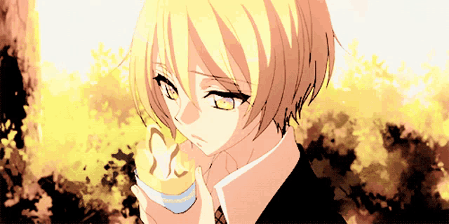 a close up of a person with yellow hair