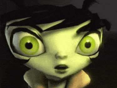 a close up of a cartoon character 's face with a surprised look on his face .