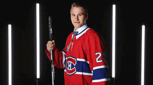 a hockey player wearing a jersey with the number 46