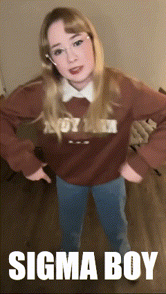 a girl in a sweater that says sigma boy