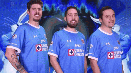 three men wearing blue shirts that say " cemento cruz "