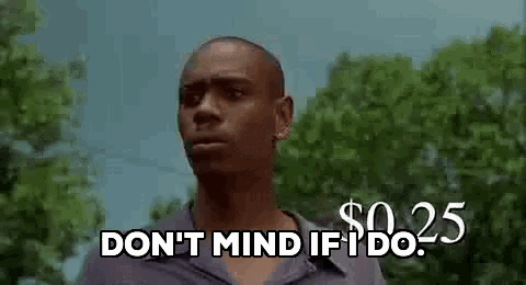a man is standing in front of trees and saying `` do n't mind if i do `` .