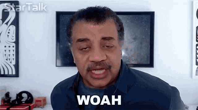 a man says woah in front of a star talk logo