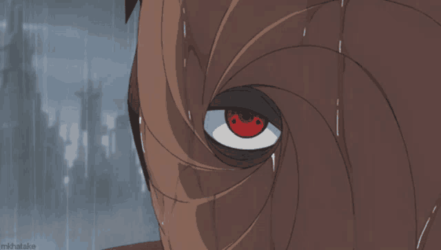 a close up of a person 's face with a red eye and a caption that says mikhatake