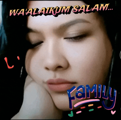 a close up of a woman 's face with the words wa alaikaim salam written on the bottom