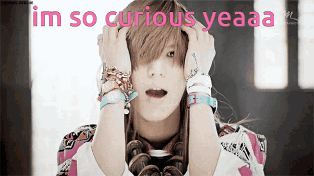 a girl with a surprised look on her face and the words i 'm so curious yeaaa above her
