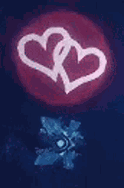 two hearts are connected to each other on a blue background .