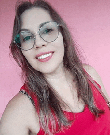 the woman is wearing glasses and a red tank top .
