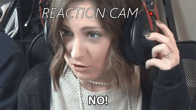 a woman wearing headphones with the words " reaction cam " above her head