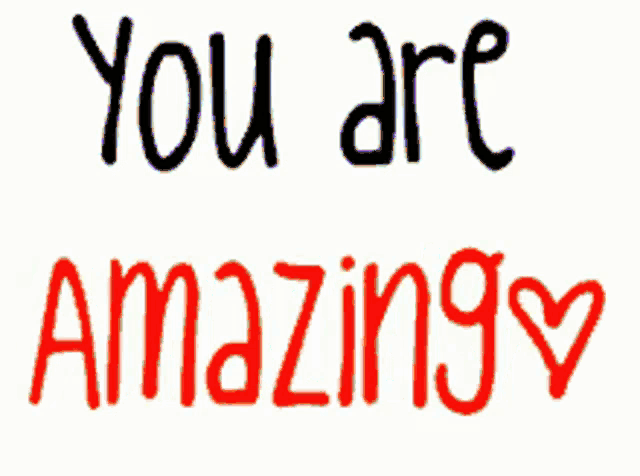 a sign that says " you are amazing " with a heart in the middle