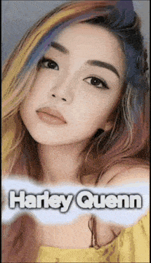 a woman with rainbow hair and the name harley quenn on the bottom