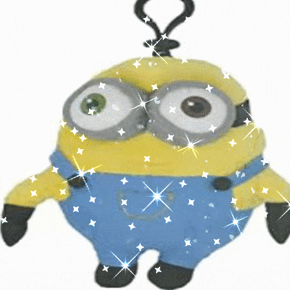 a stuffed minion with a question mark on its head