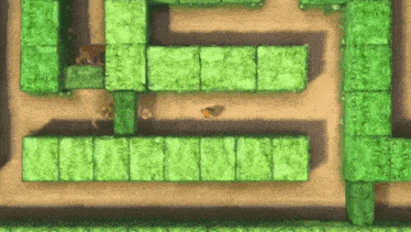 a man is walking through a maze of green blocks .