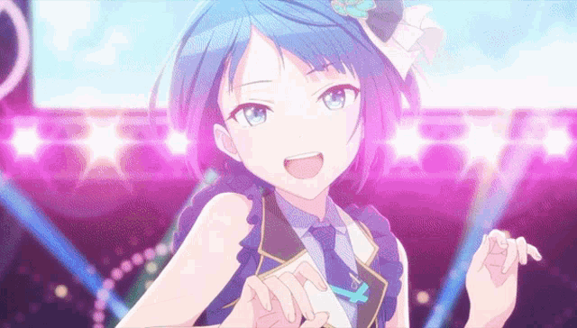a girl with blue hair is standing in front of a stage with purple lights .