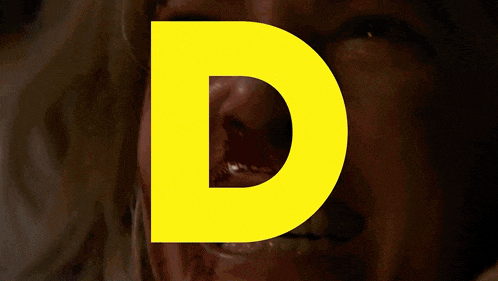 a yellow letter r is displayed on a car windshield