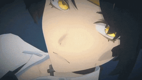 a close up of a person 's face with a cross on their neck