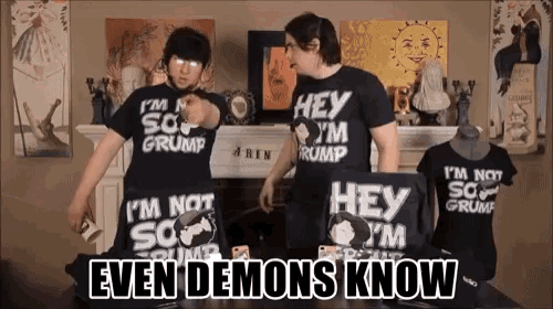 two men wearing shirts that say i 'm not so grumpy and hey i 'm grump