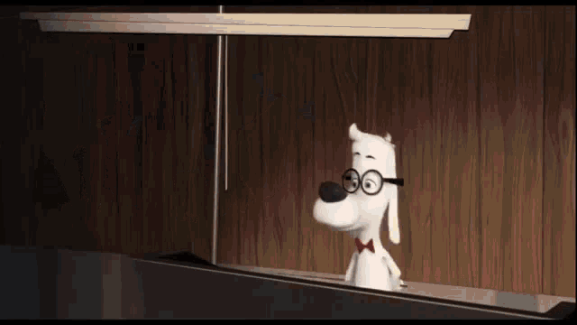 a cartoon dog wearing glasses and a bow tie is standing on a wooden shelf .