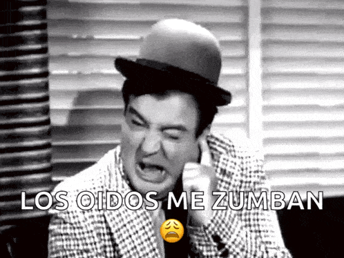 a black and white photo of a man with the words los oidos me zumban