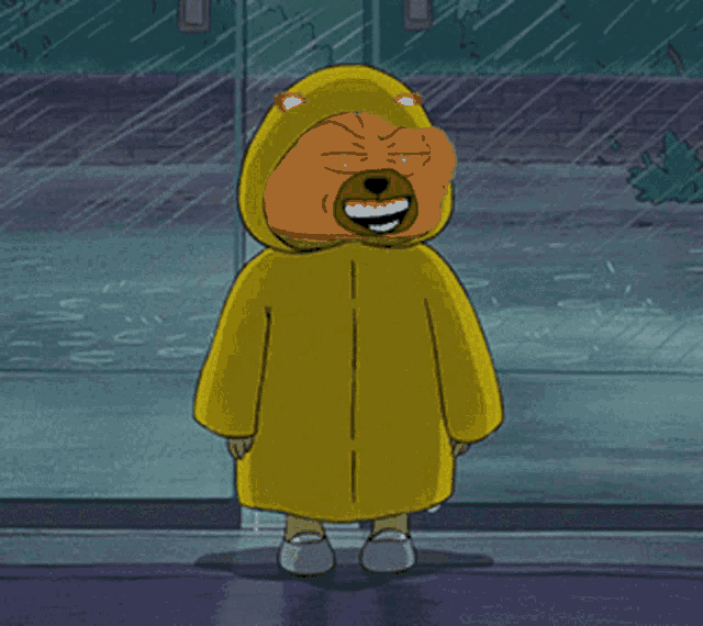 a cartoon character wearing a yellow raincoat with a bear face on it