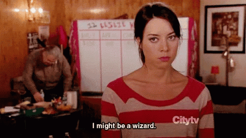 a woman in a red and white striped shirt says i might be a wizard .