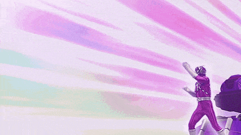 a purple power ranger is standing on top of a purple tower .