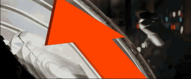 a red arrow points to a person holding a gun