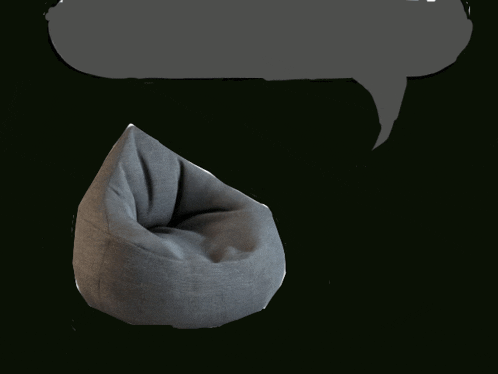 a gray bean bag chair with a speech bubble above it on a black background