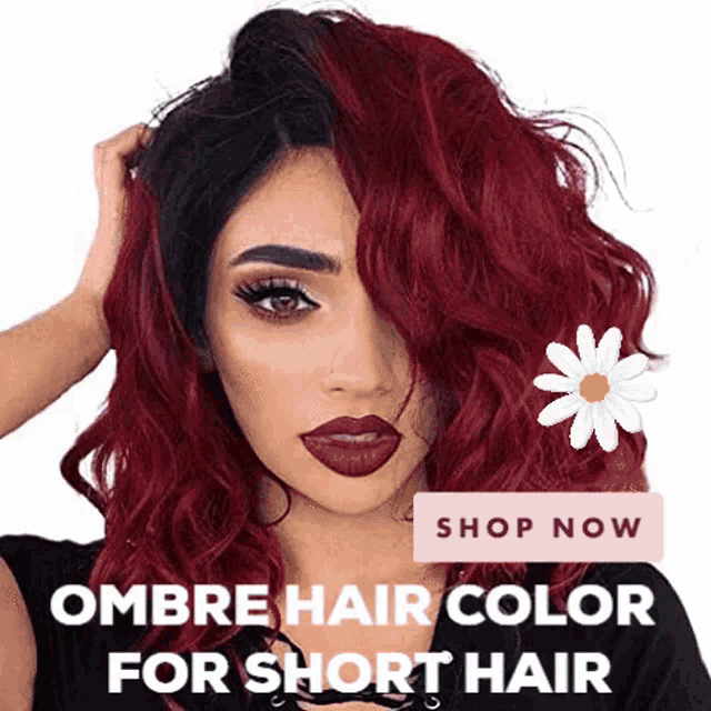 a woman with ombre hair color for short hair is holding her hair .