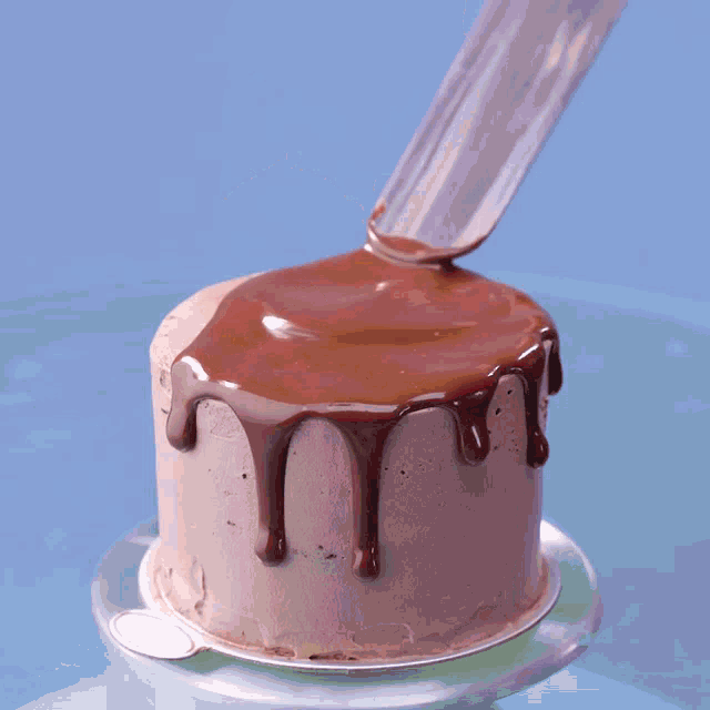 a person is dipping a strawberry in chocolate with the number 21