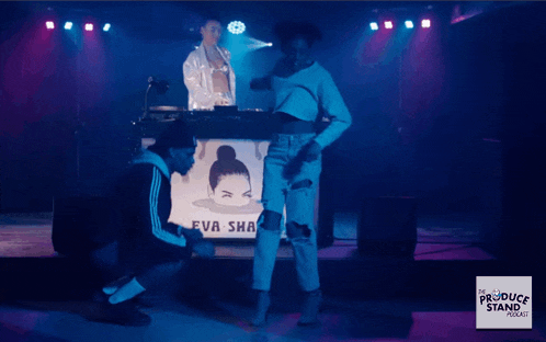 people dancing in front of a sign that says produce stand podcast