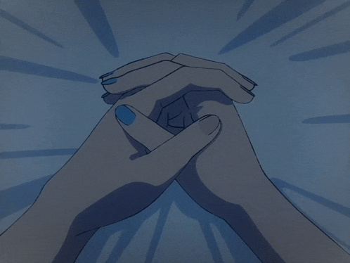 a woman with blue nails is praying with her hands folded together