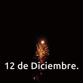 a fireworks display in the night sky with the date 12 de diciembre