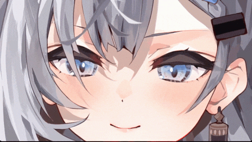a close up of a girl 's face with blue eyes and gray hair
