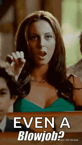 a woman in a green dress is asking for a blowjob .
