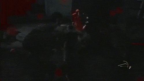 a man with a gun in his mouth is being attacked by another man