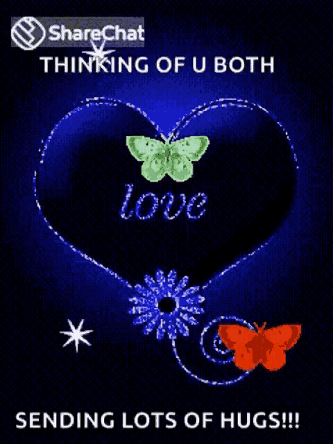 a blue heart with the word love on it and flowers