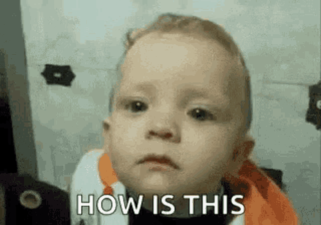 a baby is making a face and saying `` how is this '' .