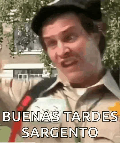 a man is holding a sign that says buenas tardes sargento