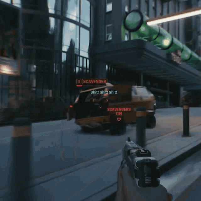 a person holding a gun in front of a vehicle with scavengers written on it