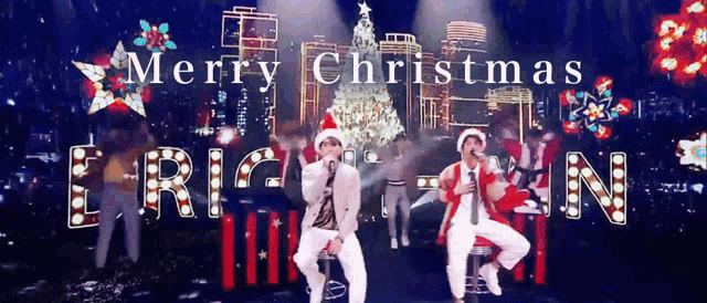 a merry christmas greeting card with two men singing into microphones