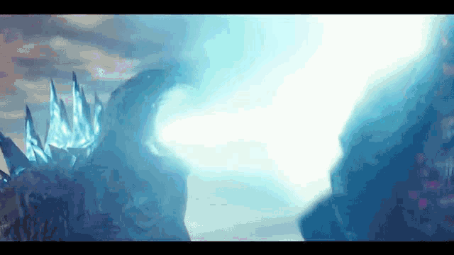 a blue light is coming from a monster 's head