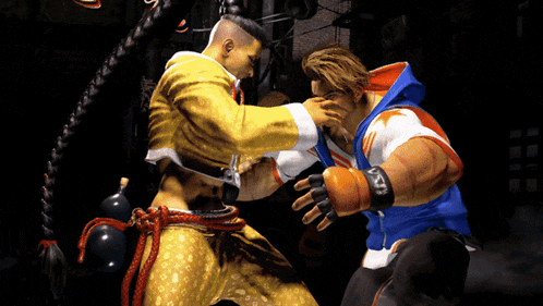 a man in a blue and white hoodie with the letter s on it is fighting another man in a yellow jacket