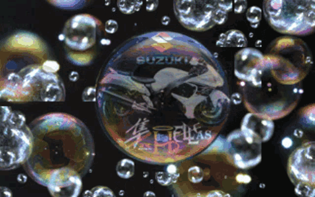 a soap bubble with a picture of a suzuki motorcycle in it