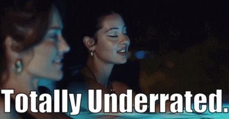 two women in a hot tub with the words totally underrated behind them
